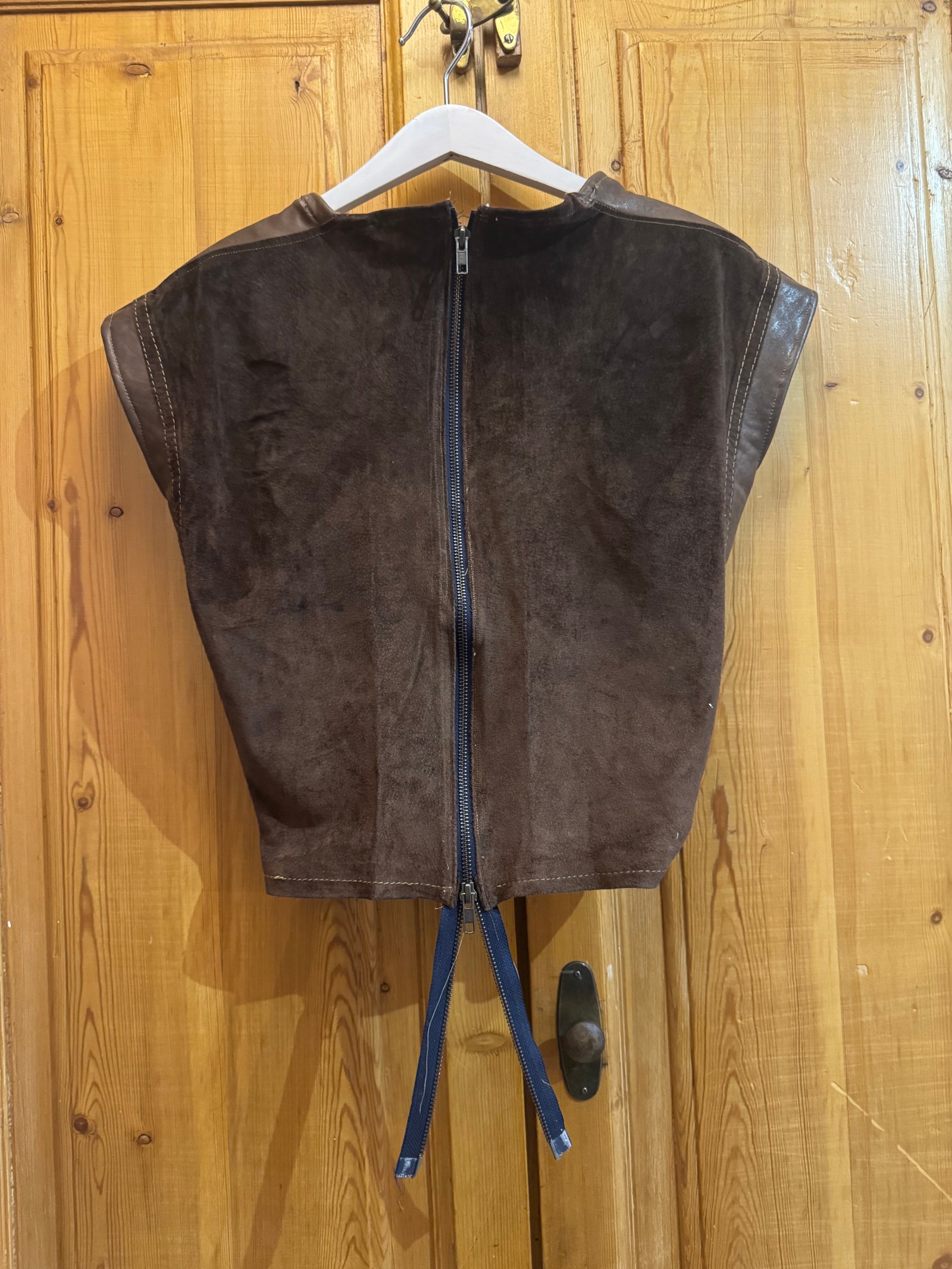 Brown zip vest with tie hem