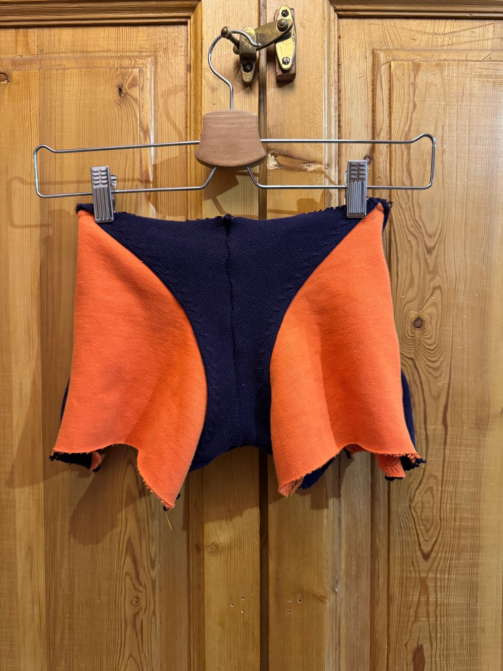 Varsity sweatshirt shorts, orange and navy